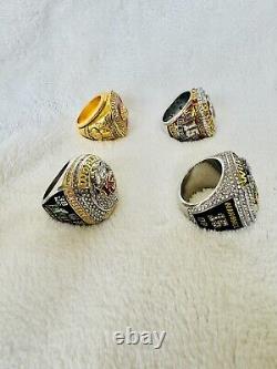 Ensemble complet de 4 bagues de championnat des Kansas City Chiefs dans une boîte