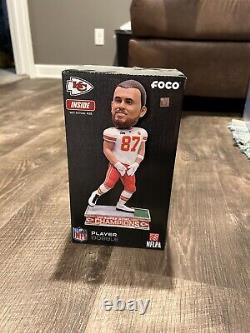 Travis Kelce Kansas City Chiefs Super Bowl LVII Champions Stanky Leg Bobblehead

 	<br/><br/>
 Translate to French: Figurine à tête branlante de Travis Kelce des Kansas City Chiefs, champions du Super Bowl LVII, avec la danse Stanky Leg